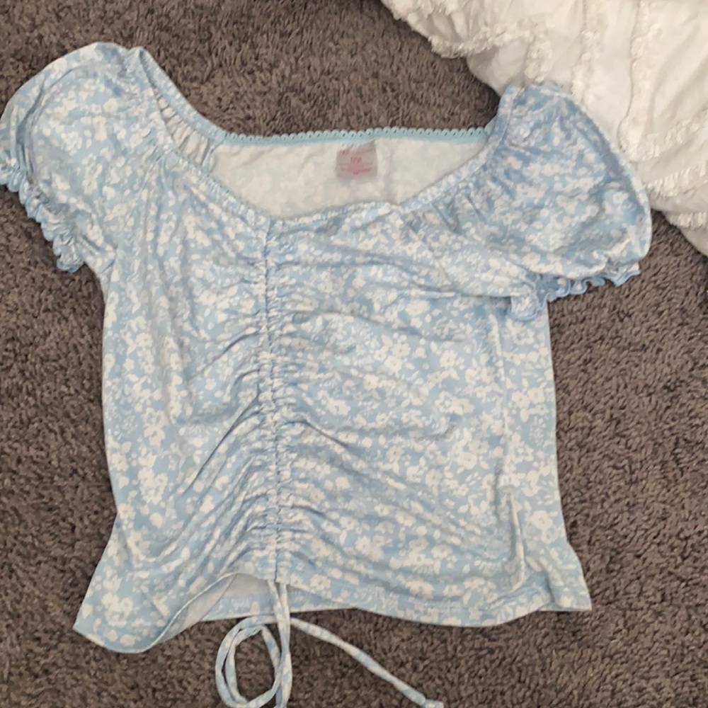 light blue top with flowers